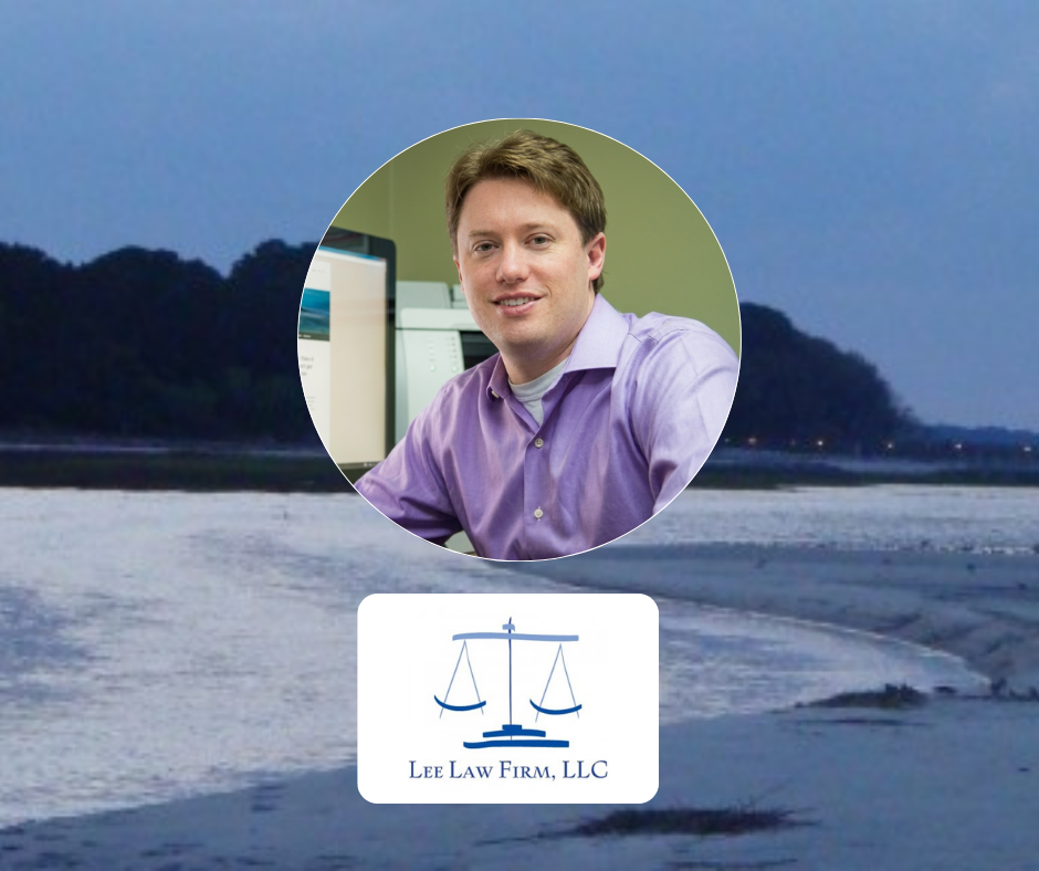 Portrait of an attorney above the Lee Law Firm logo with a waterfront and marsh landscape background.